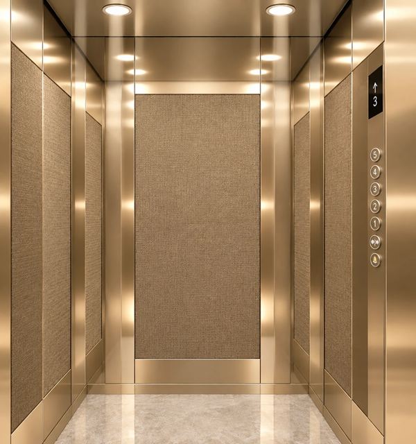 Champagne Reserve cabin: jute panels framed in champagne steel, cream marble floor