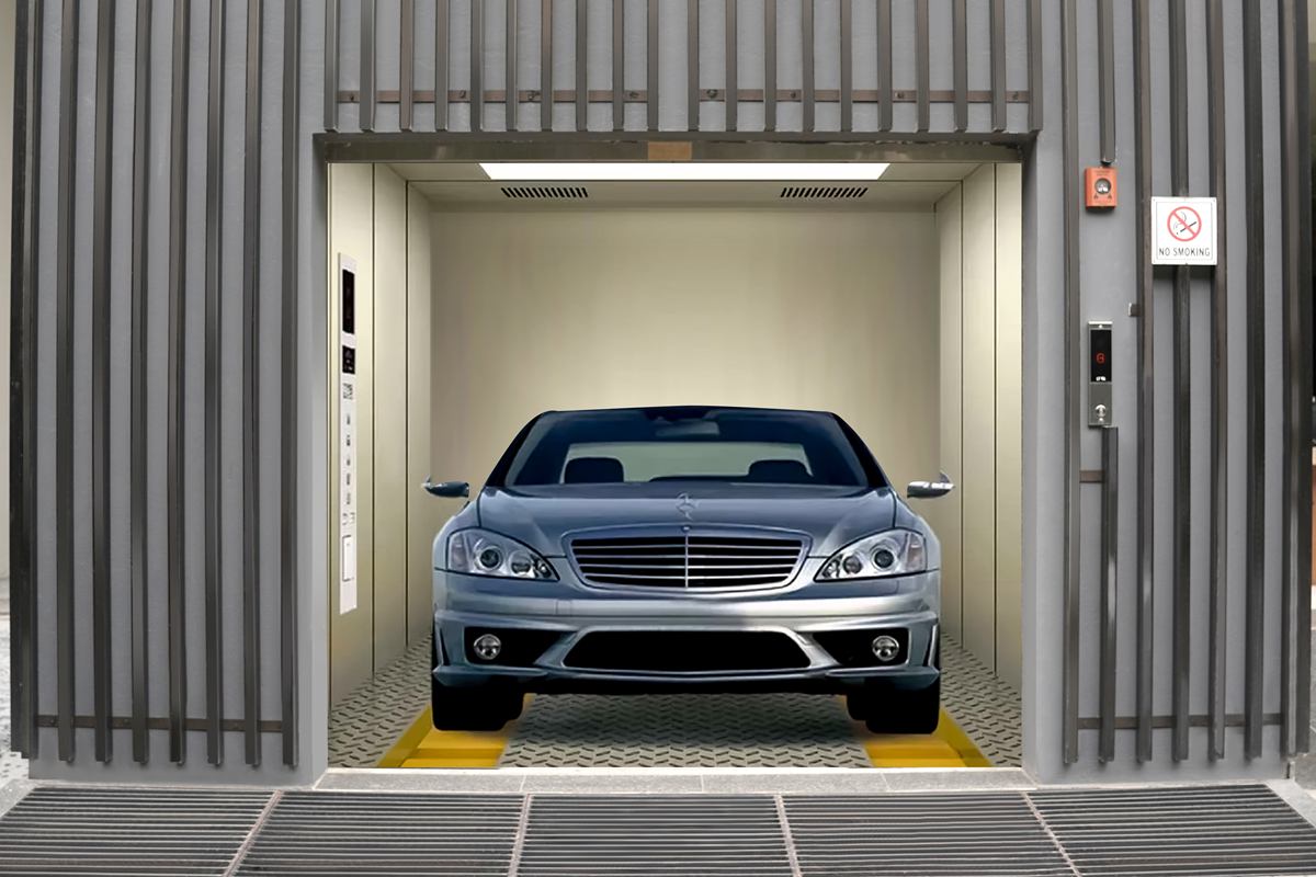 Car lift with a sedan inside the cabin